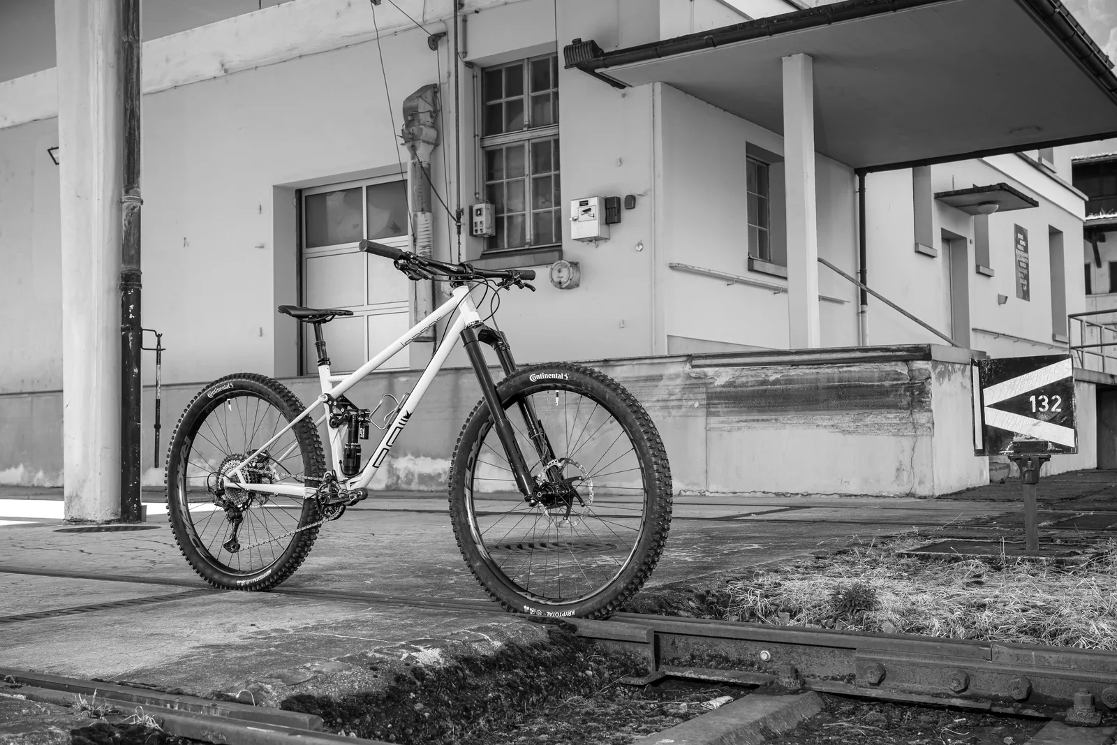 The white RAIL Lopper in front of an industrial building